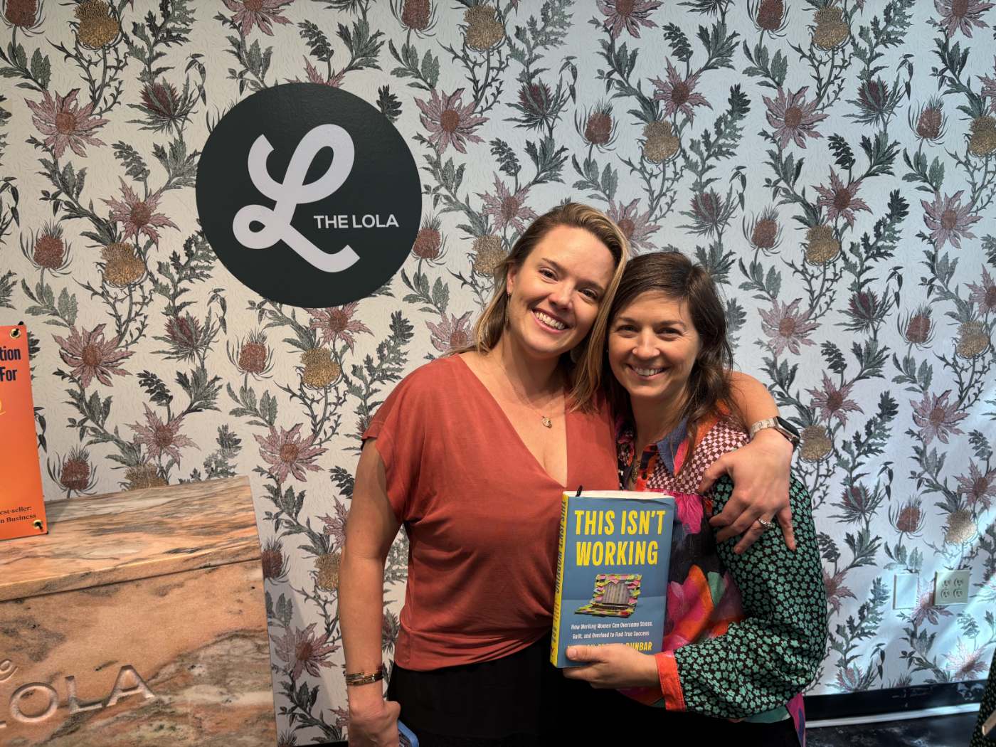 Meghan taking a selfie with a reader at The Lola